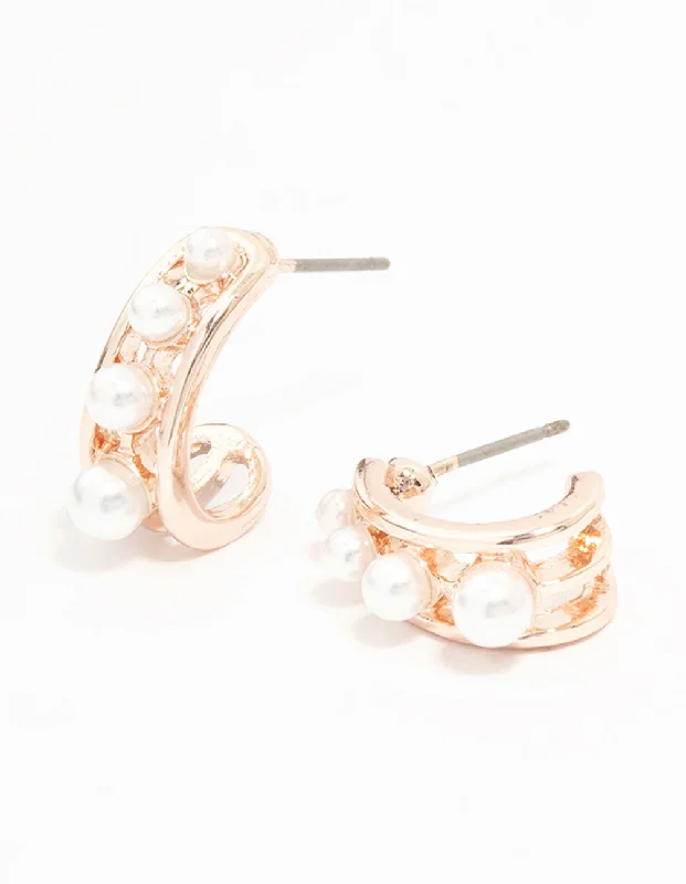 Star Shaped Earrings-Rose Gold Pearl In Lay Huggie Earrings